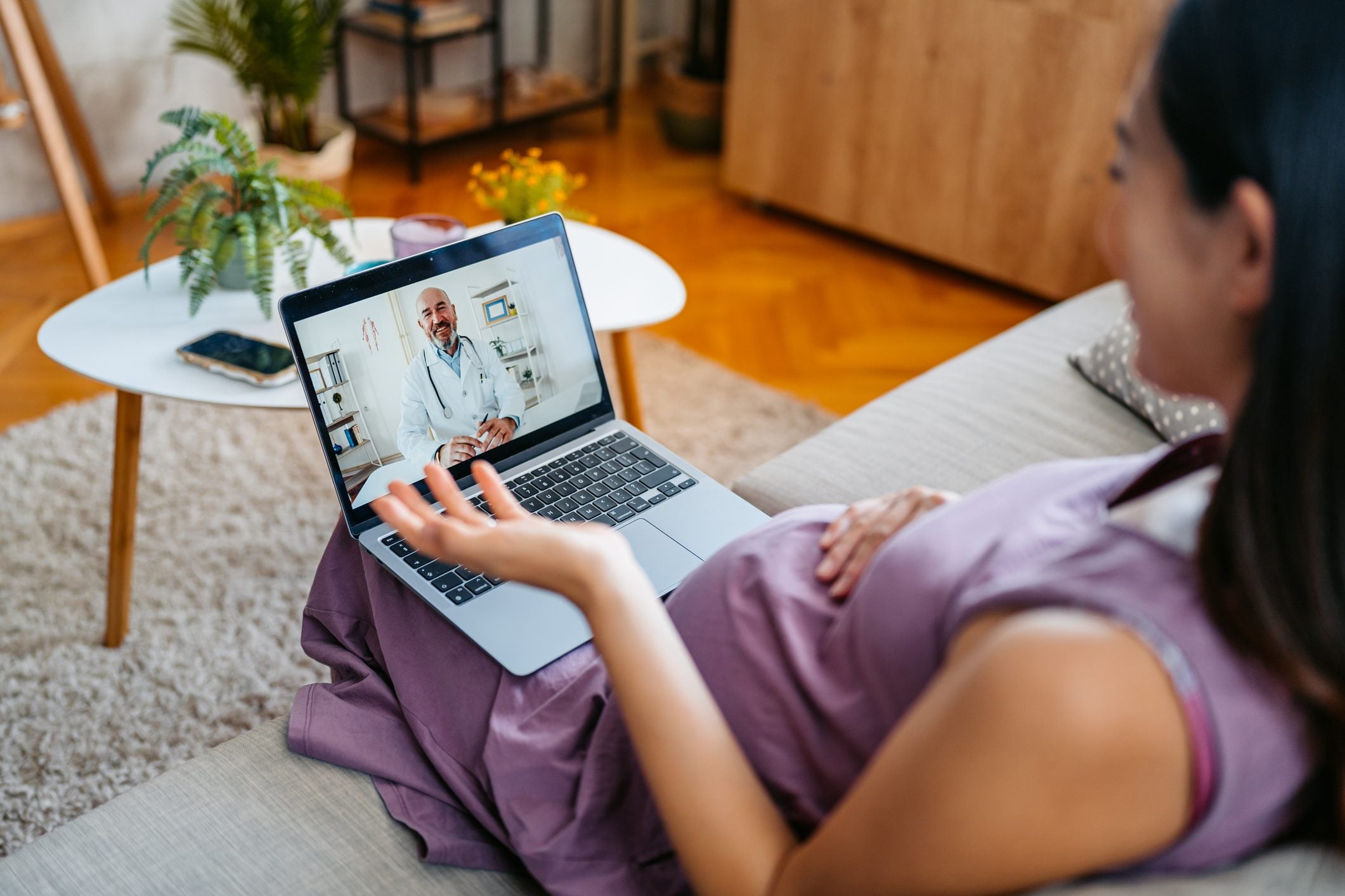 A member on a video visit at home